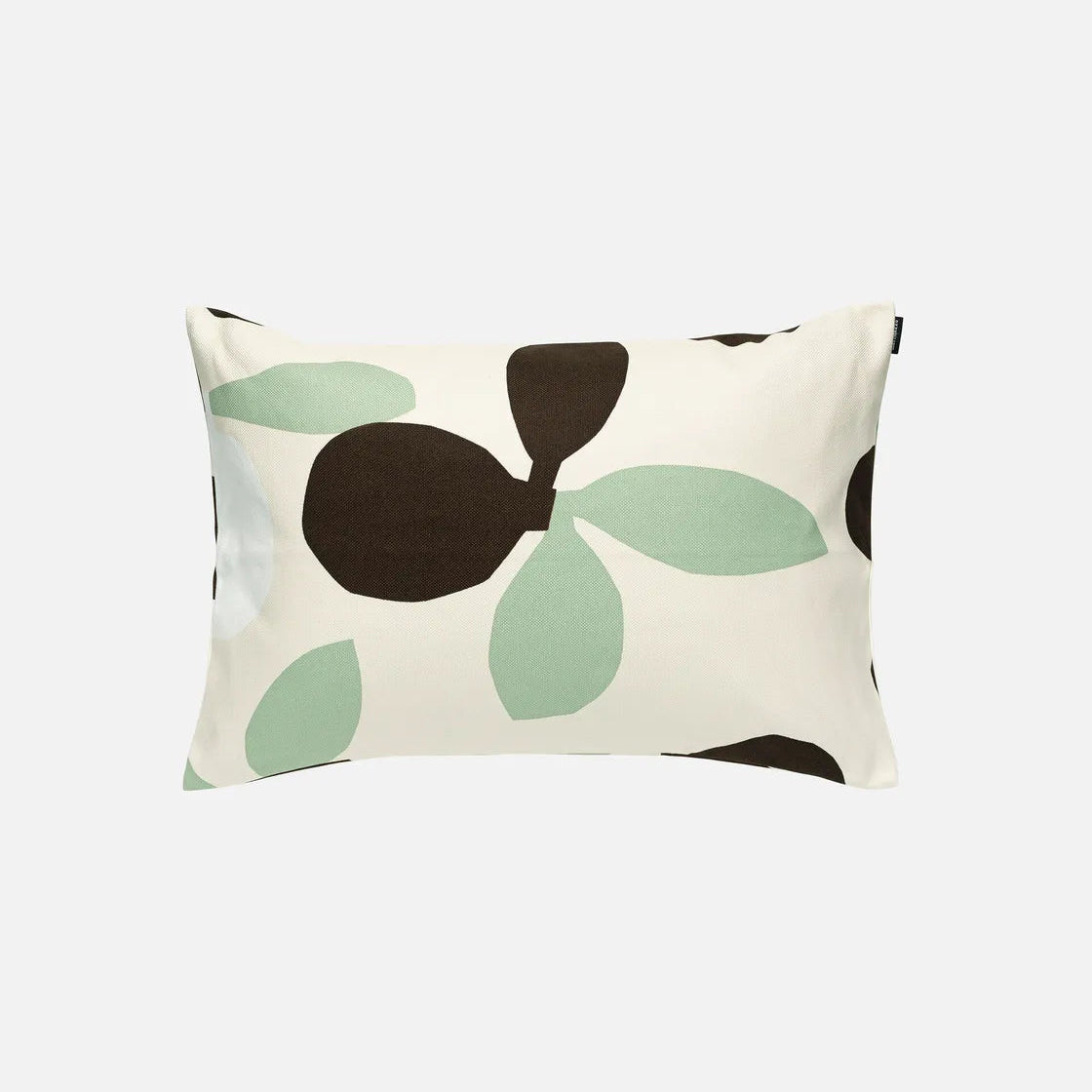 Decorative pillow with green and brown leaf pattern on a white background