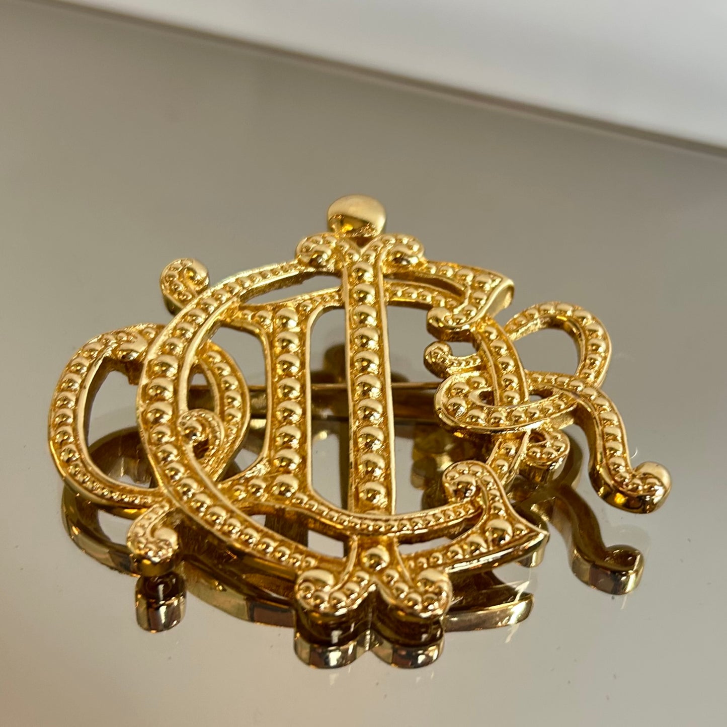 Christian Dior Gold Plated Monogram Brooch