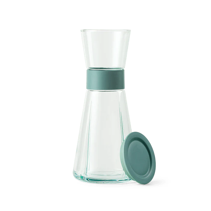 Clear glass carafe with a teal band. Rosendahl Grand Cru Carafe made from recycled glass.
