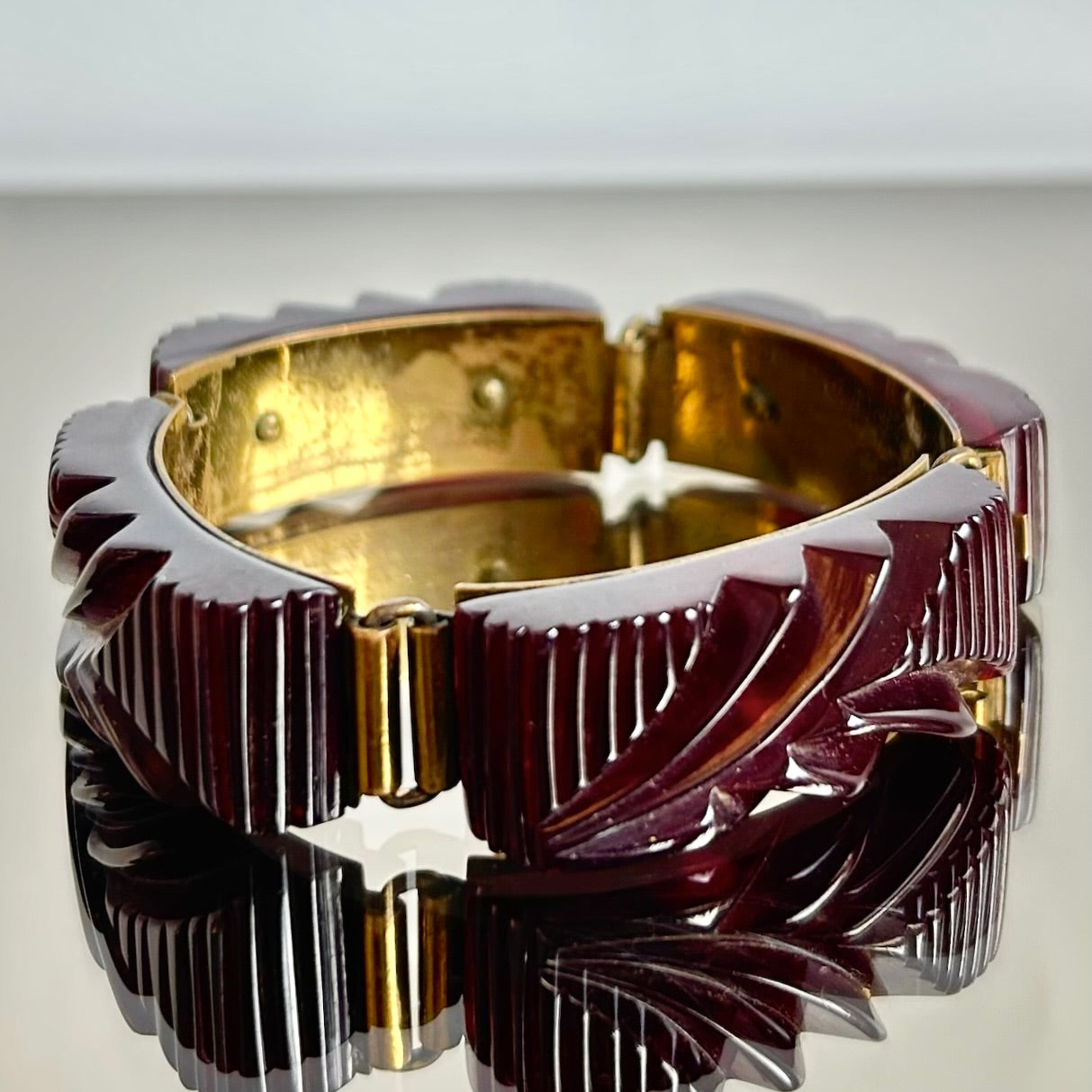 Vintage Maroon Carved Bakelite & Brass Clasp Bracelet