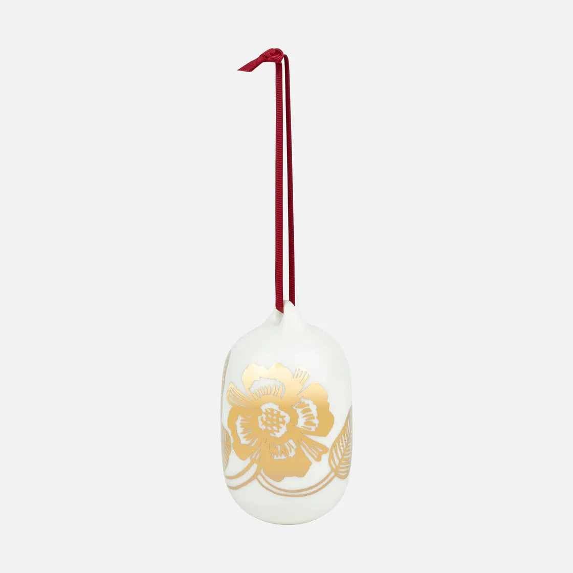 White ornament with gold flowers