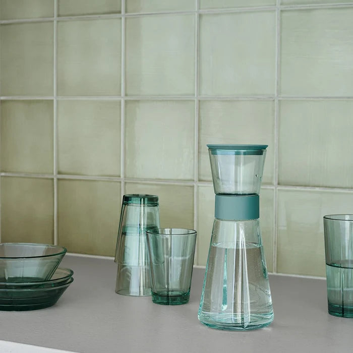 Clear glass carafe with a teal band. Rosendahl Grand Cru Carafe made from recycled glass.