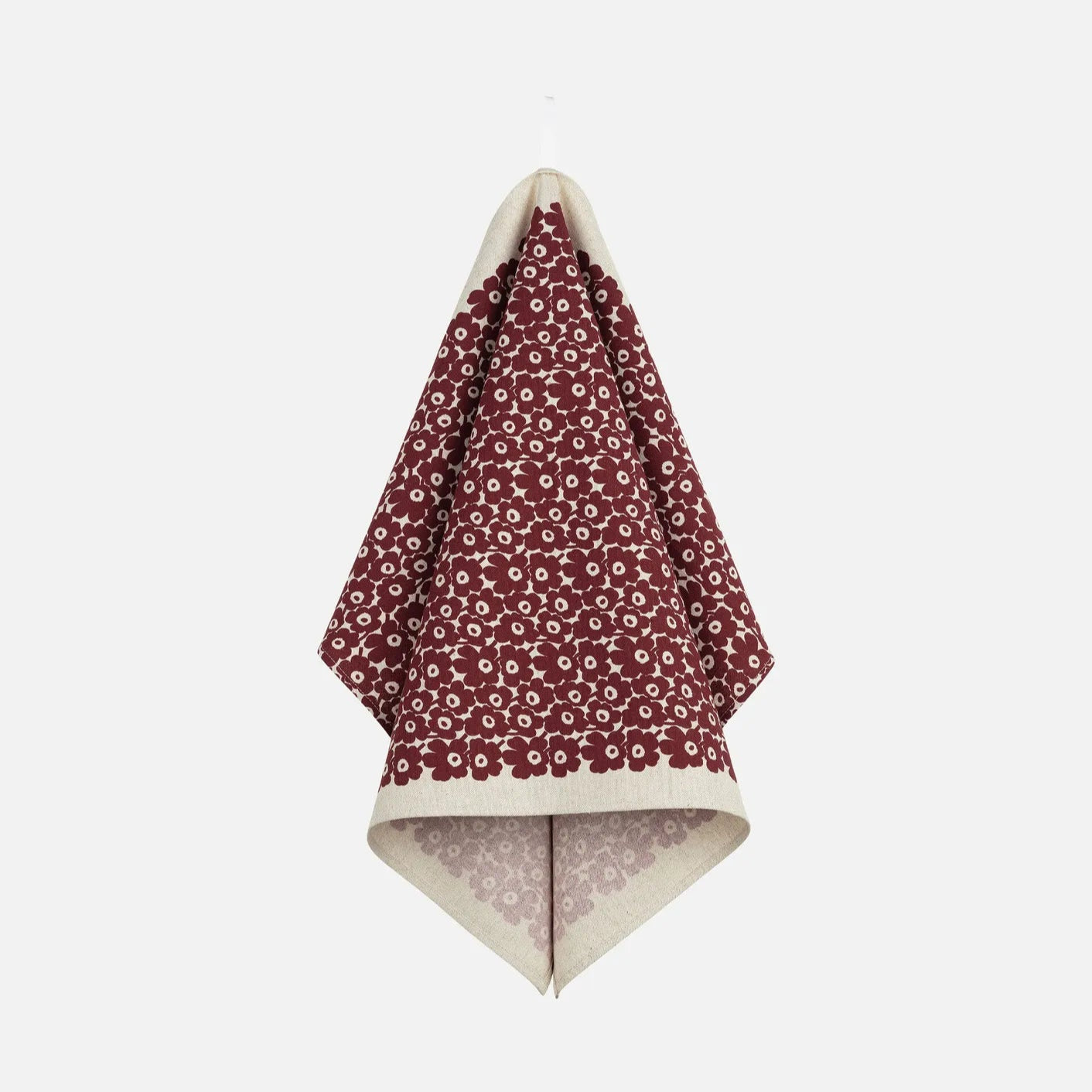 Marimekko pikkuinen unikko tea towel in burgundy and linen.