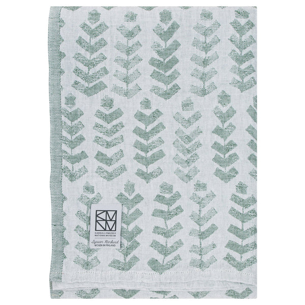 White and green towel with geometric pattern. 