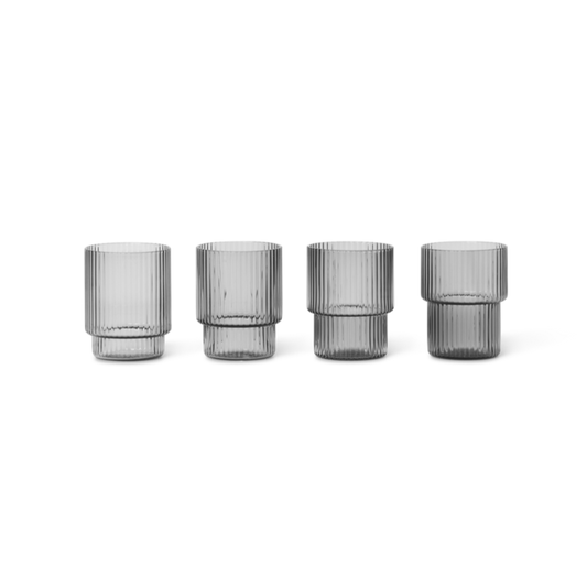 Set of 4 small sleek glasses.