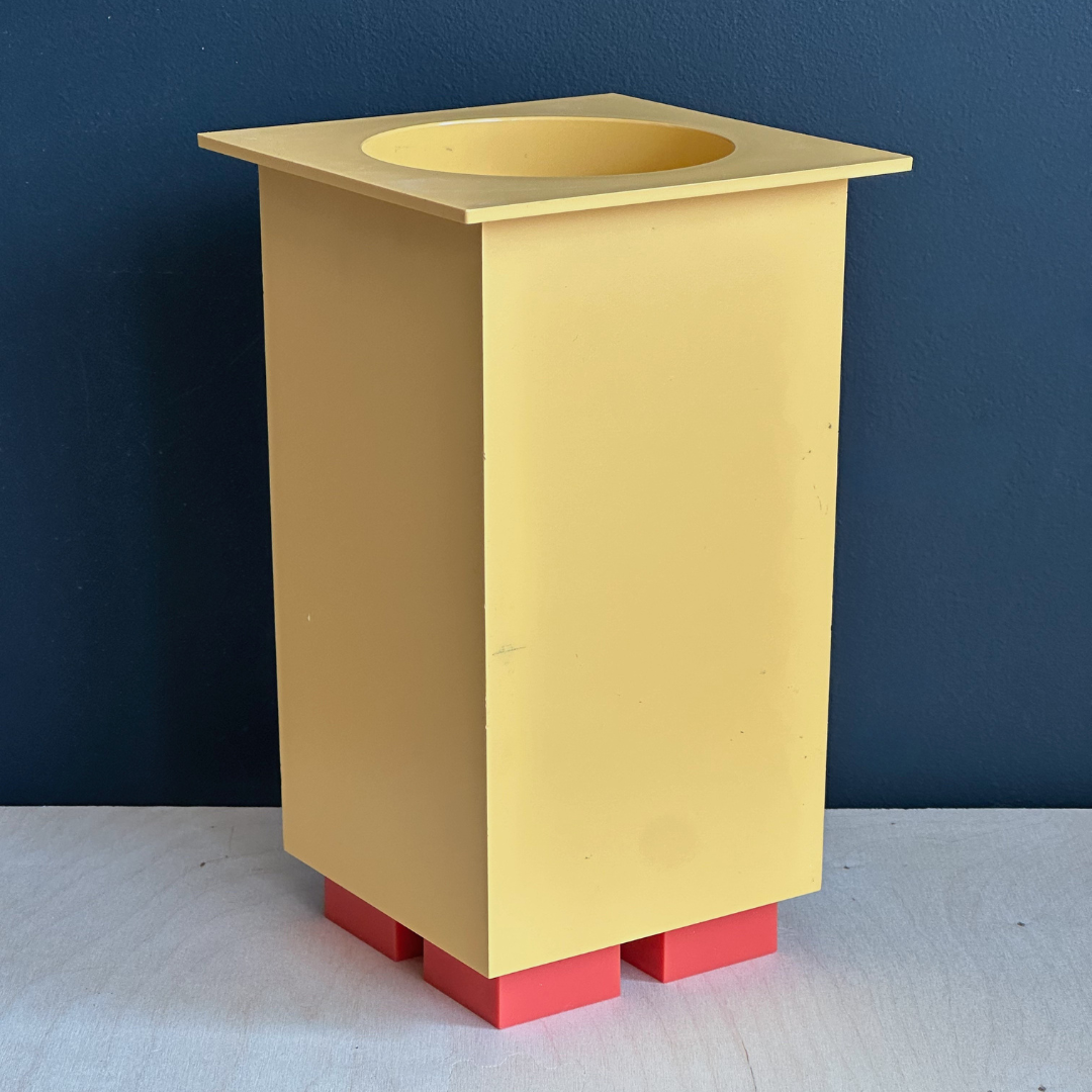 Michael Graves x Alessi yellow wine holder/cannister