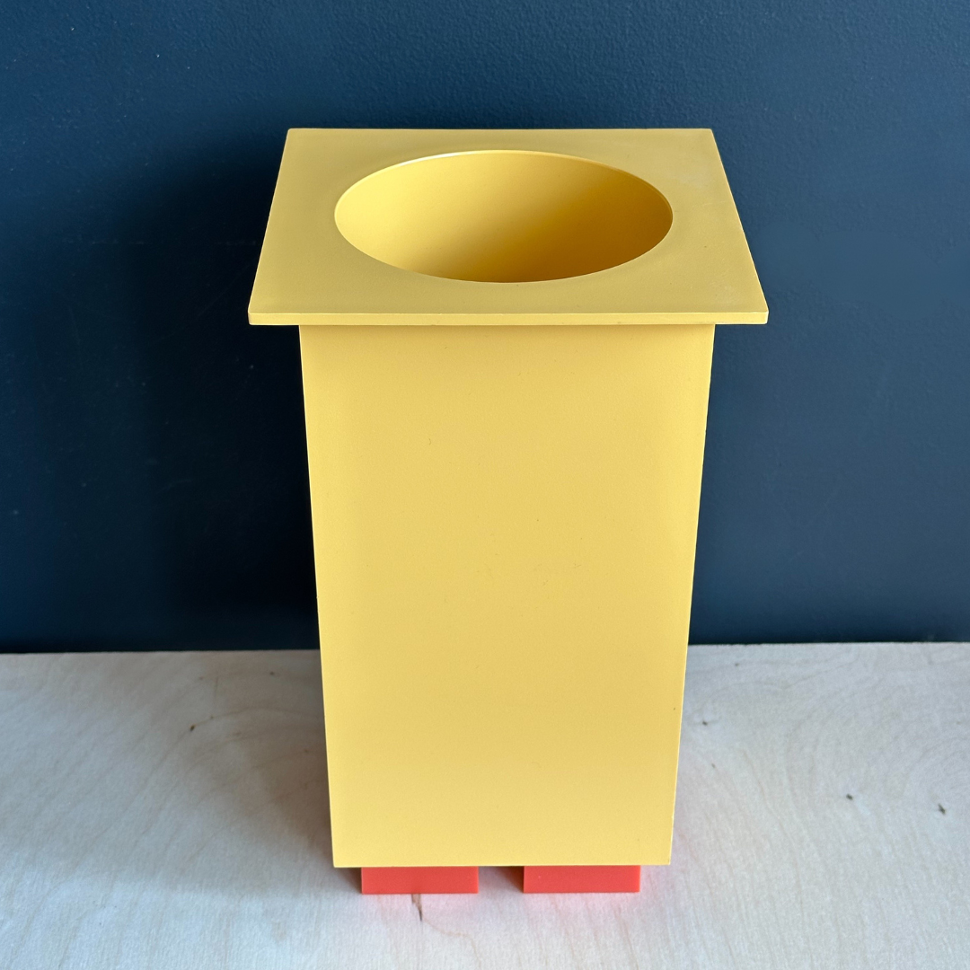 Michael Graves x Alessi yellow wine holder/cannister