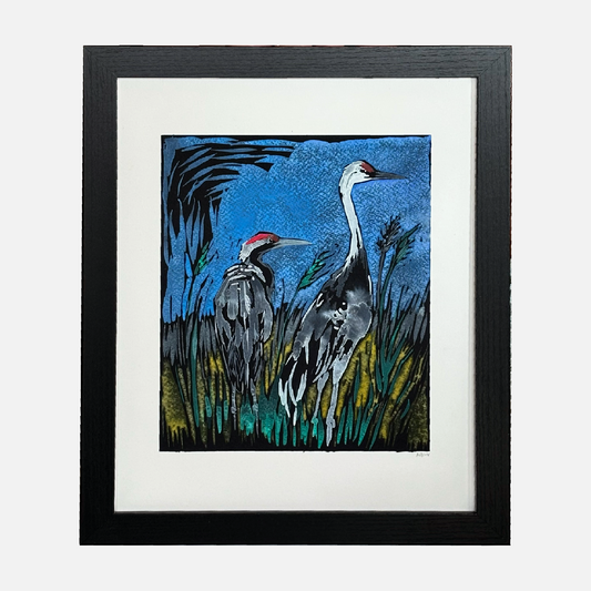 Original Painting of two cranes in a natural setting with a black frame.