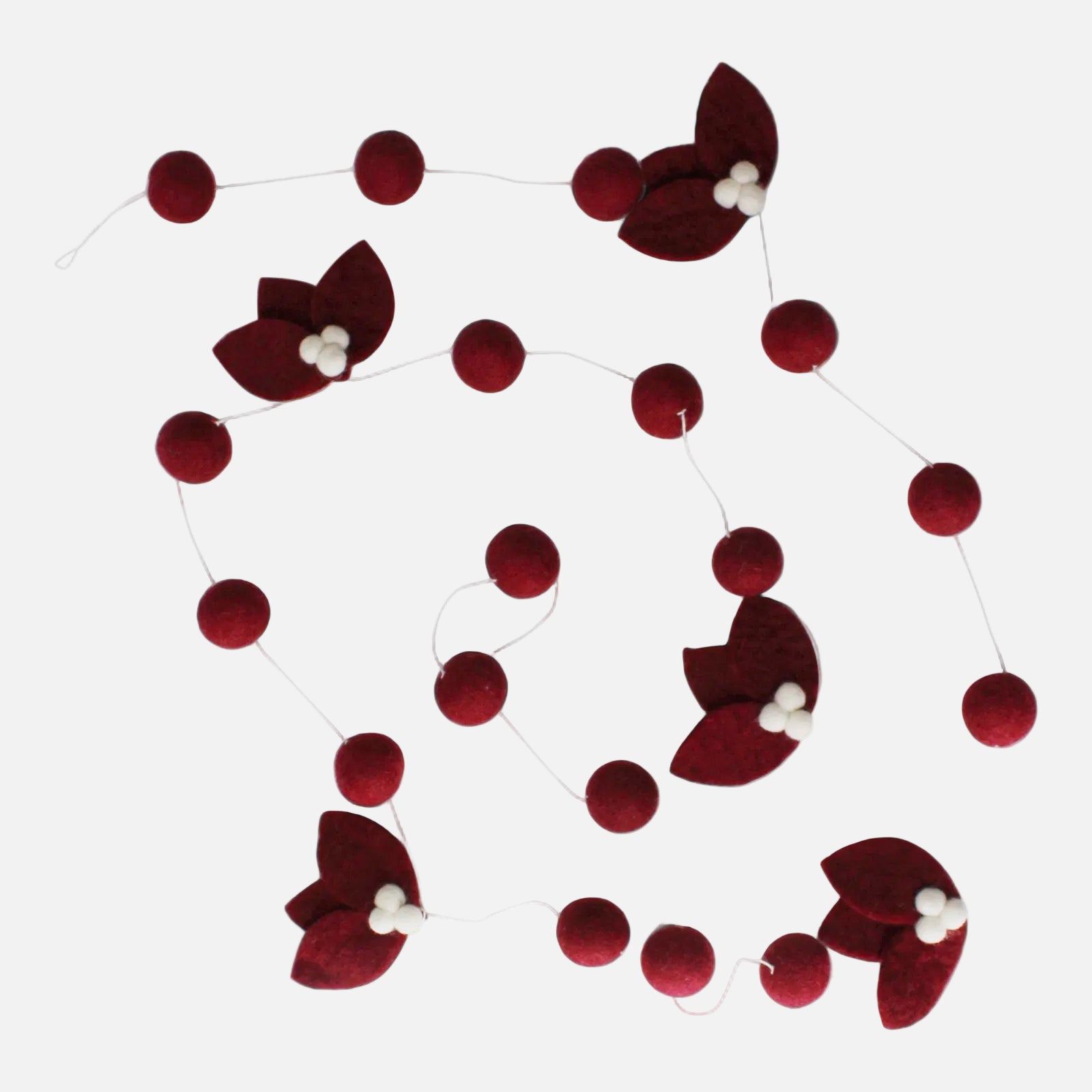 Decorative garland with red felt balls and flower shapes on a white background, handmade, fair trade, by Gry & Sif