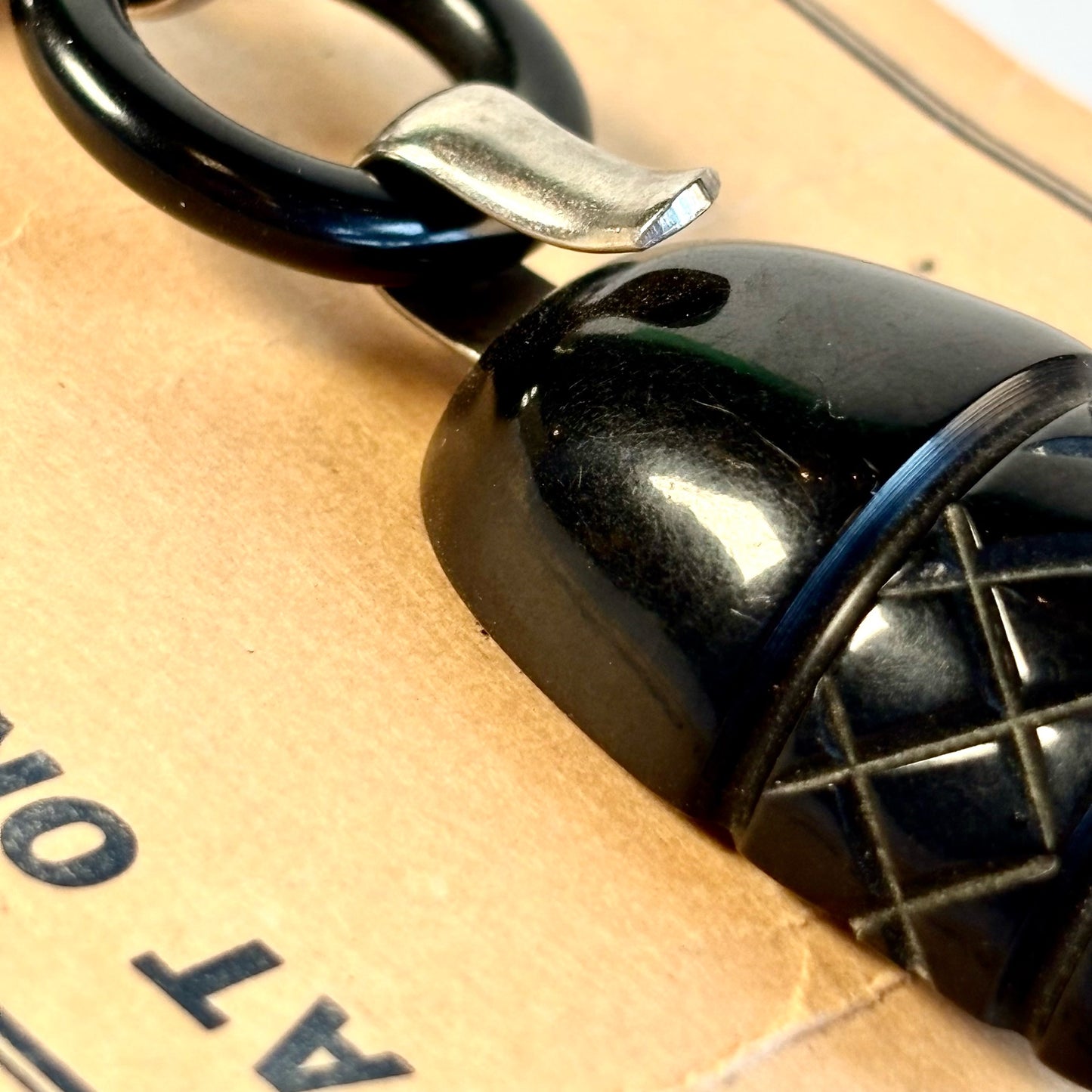 Vintage Black Bakelite Cape and Coat Ornament