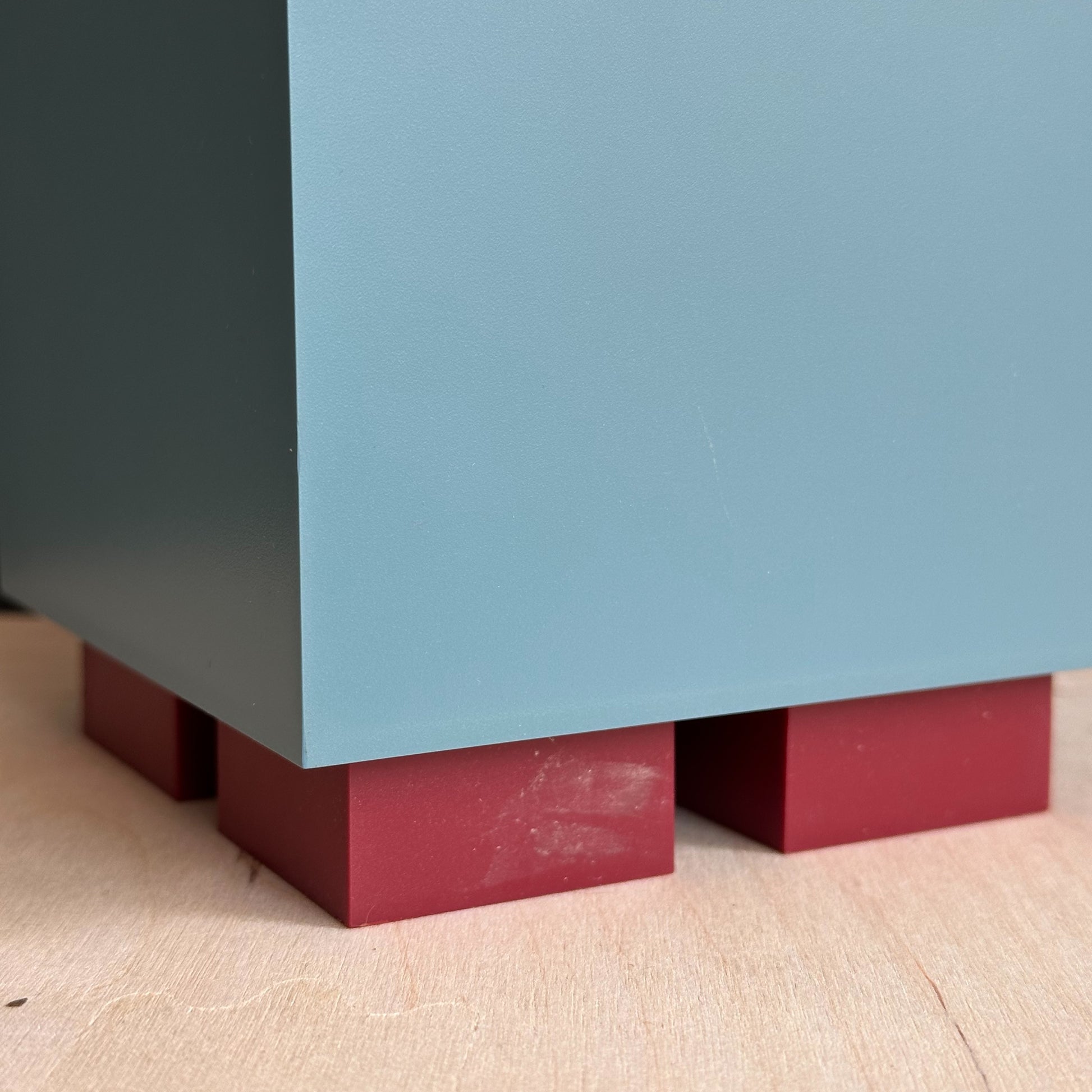 Michael Graves x Alessi blue canister with red lid and feet details