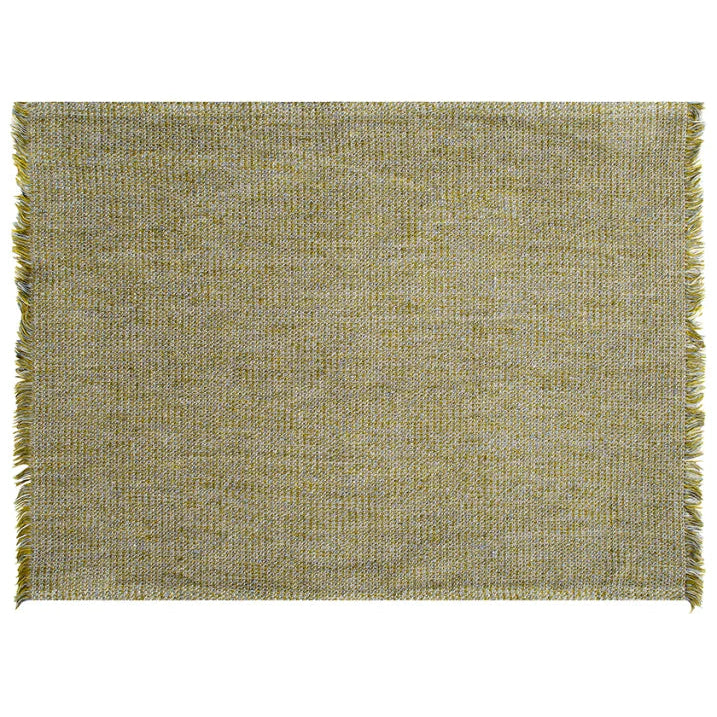 Textured green placemat with frayed edges on a white background
