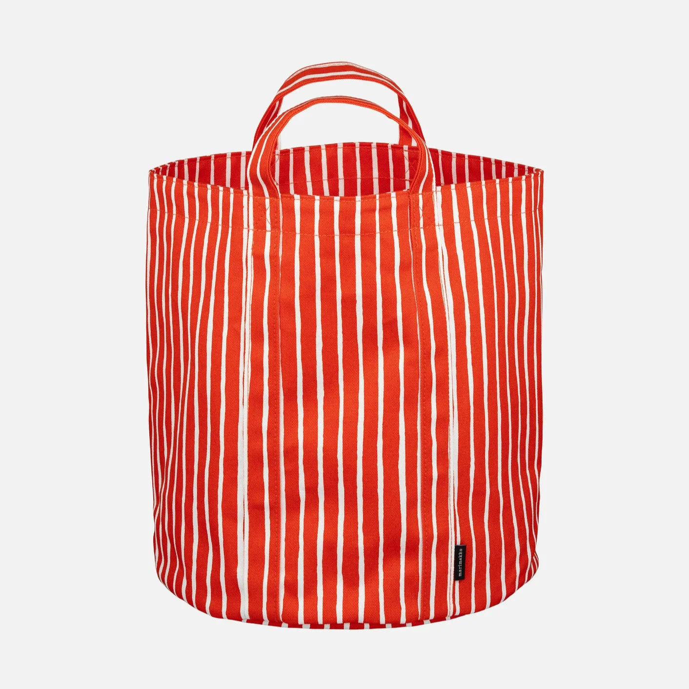 Red and white striped storage container in Piccolo pattern by Marimekko