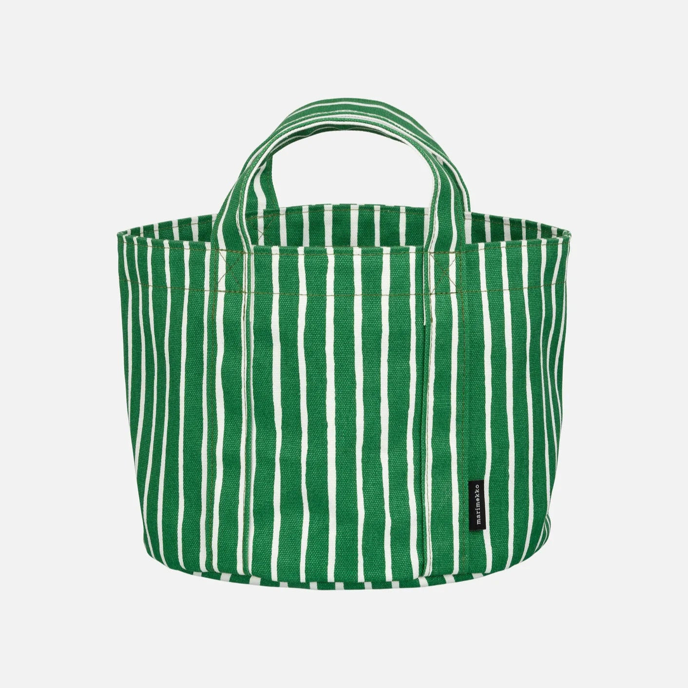 Green and white striped storage tote in Piccolo pattern by Marimekko