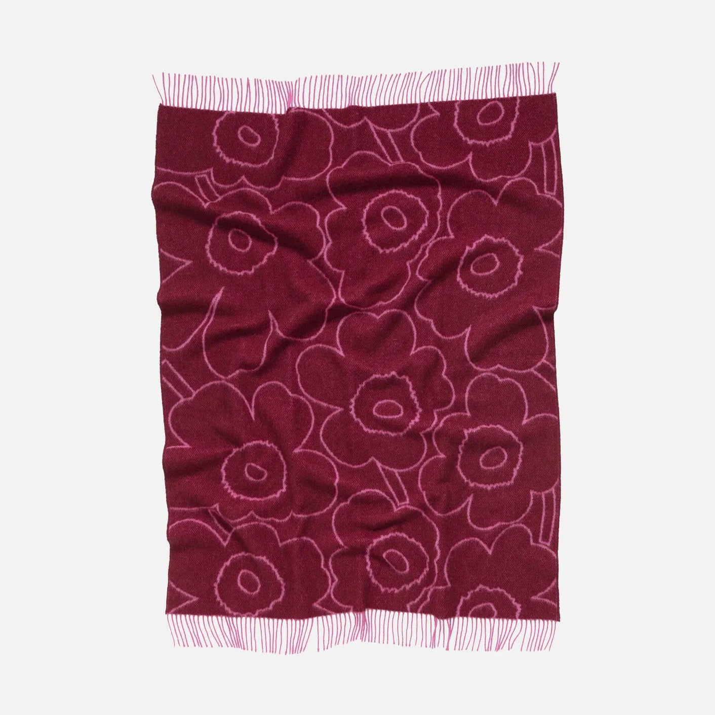Marimekko Piirto Unikko Blanket in burgundy and fuschia. 