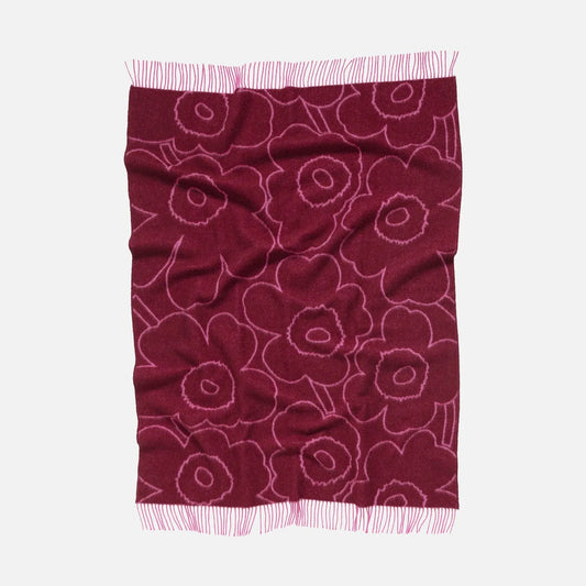 Marimekko Piirto Unikko Blanket in burgundy and fuschia. 