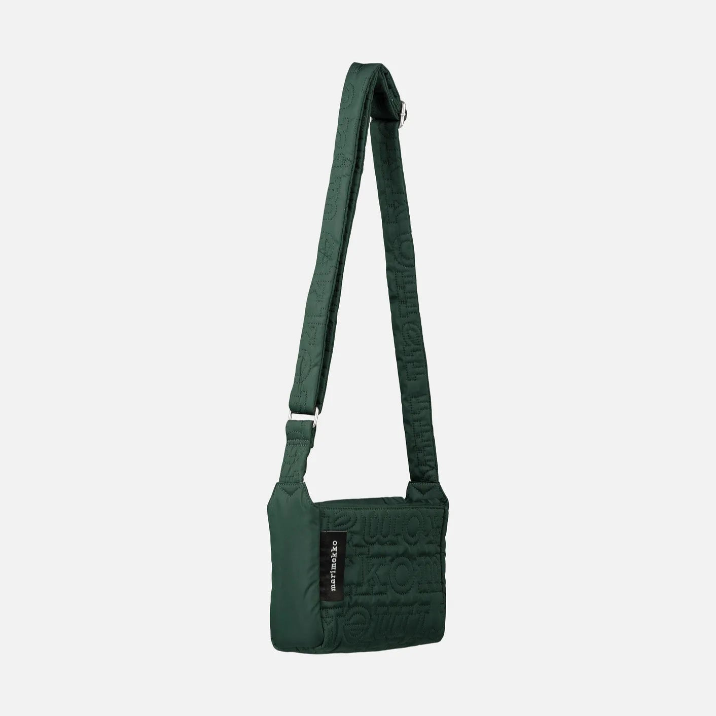 Green crossbody bag on a light gray background