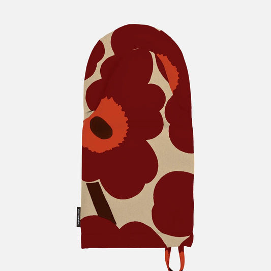 Oven mitt with red floral pattern on a beige background