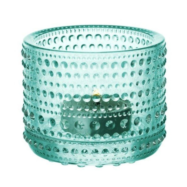 Water green dotted glass tealight candleholder.