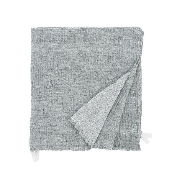 White and grey linen towel. 