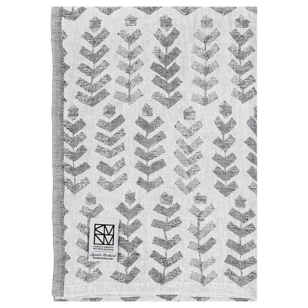 White and grey towel with geometric pattern.