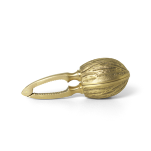 Brass walnut shaped nutcracker.