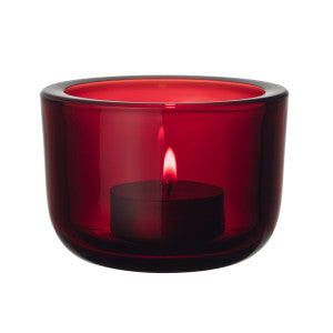 Red colored glass tealight candleholder.