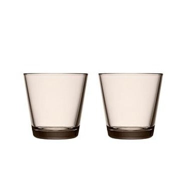 Linen colored glass tumblers on white background.
