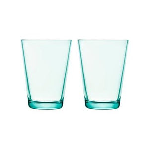 Water green glass tumbler on white background.