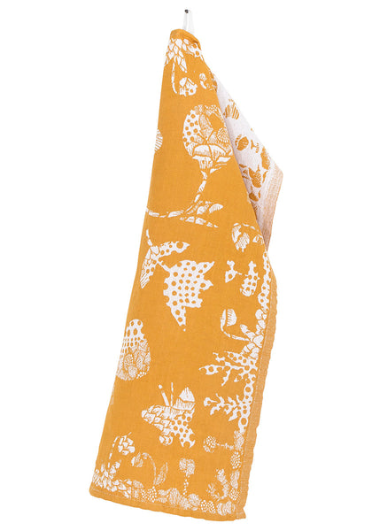 The tea towel has a flower and butterfly pattern on cloudberry yellow and white linen.