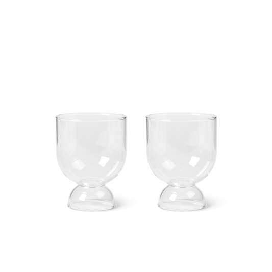 Set of two small clear glasses.