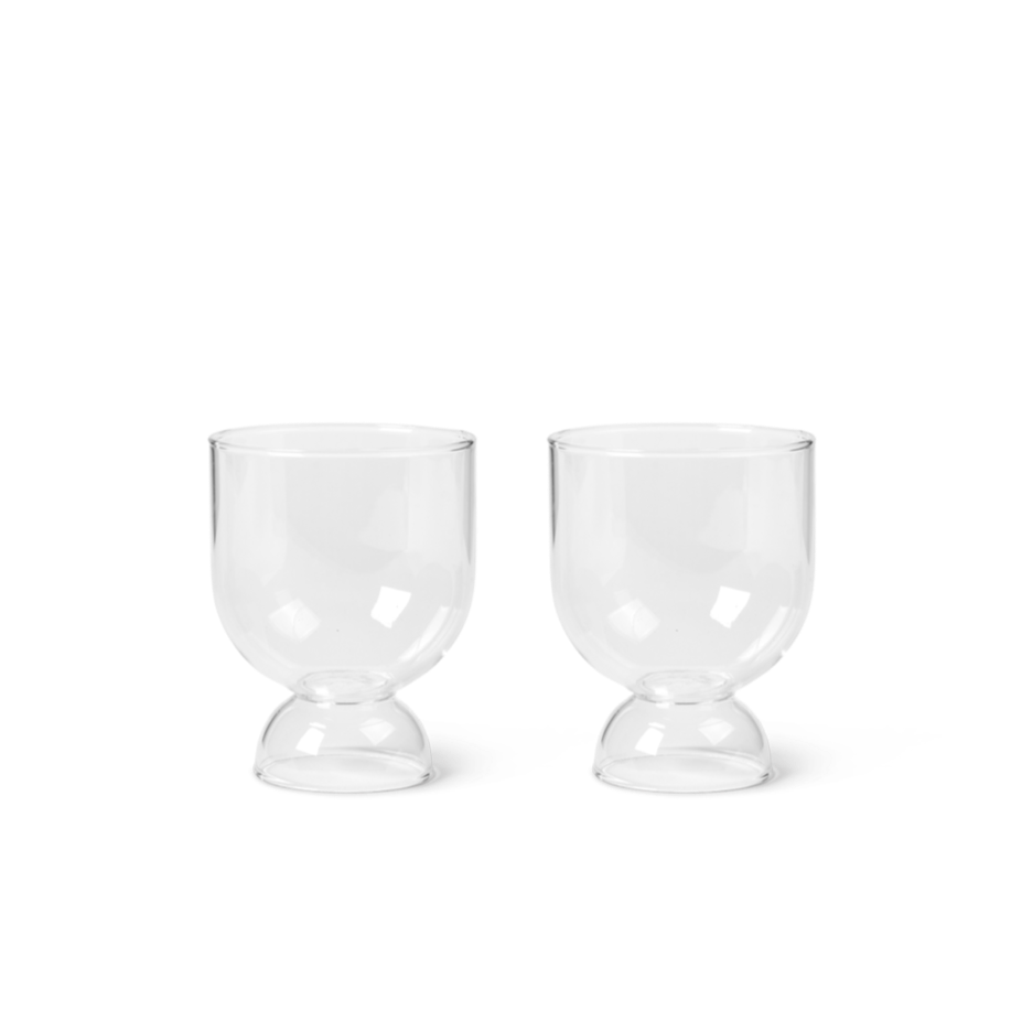Set of two small clear glasses.